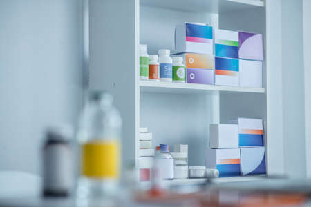 Drug store. Pills and vitamines on the shelves in the storeの写真素材