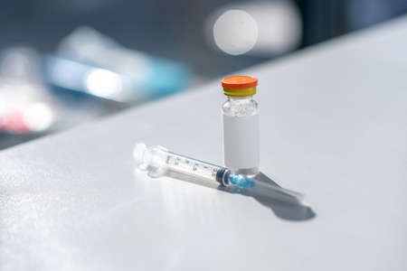 Medicine. Picture of a syringe and a vial with medicineの写真素材