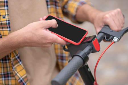 Wireless. Man holding a smartphone and using wireless connection