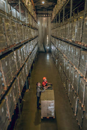 Working. Top view of a person working in the megastoreの写真素材