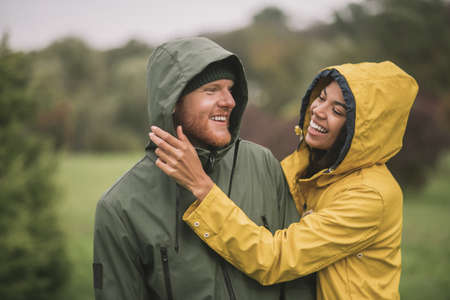 Happy day. Young happy couple having fun in the parkの写真素材