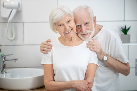 Happy couple. Elderly couple in the bathroom looking happy and smilingの写真素材
