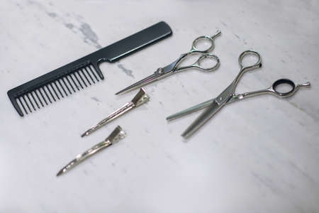 Tools. Close up picture of hairdressing tools on the table