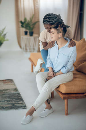 Romantic relationship. Two girls spending time together and looking romantic