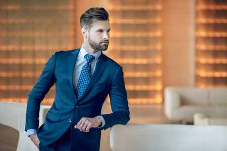 Picture of a handsome man in a nice blue suit and tieの写真素材