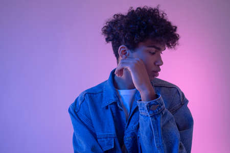 Stylish african american male model in denim jacketの写真素材