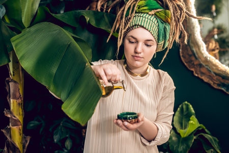 Young woman preparing naural beauty products and looking busy
