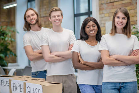 Group of young people at recycling centerの写真素材