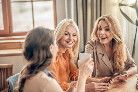 Group of women spending time together and feeling excitedの写真素材