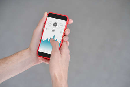Close up picture of hands with a smartphoneの写真素材