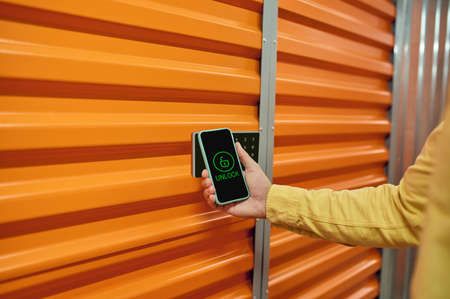 A warehouse worker testing the digital management system