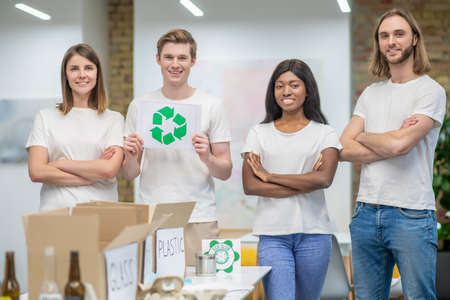 Young ecologists working in a recycling center