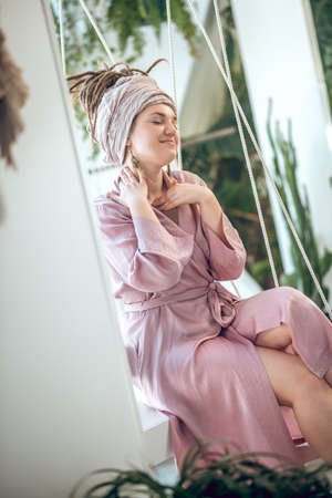 Young woman in a homewear looing relaxedの写真素材