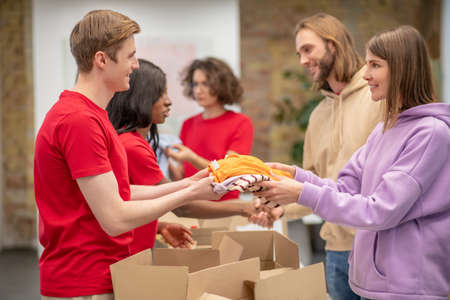 Workers of the non profit organization distributing donationsの写真素材