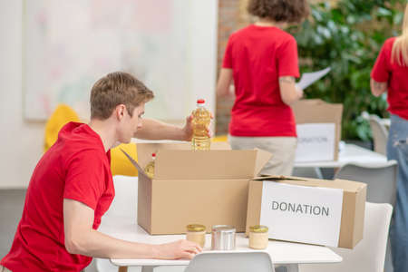 A group of young volunteers at work in a distribution point