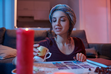Young female soothsayer trying to predict future
