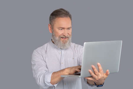 Bearded businessman looking confident and determinedの写真素材