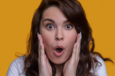 Surprised lady staring at something in the distanceの写真素材