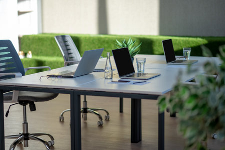 Office premises with a table for negotiations in the middle