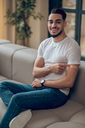 Young man feeling good after covid-19 vaccination