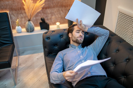 Young businessman suffering from the entrepreneurial burnoutの写真素材