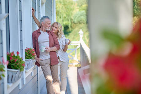 Mature couple looking romantic spending weekend out of townの写真素材