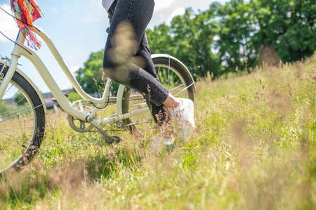 Close up picture of a woman with a bikeの写真素材