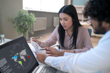 Team working on the project and looking involvedの写真素材