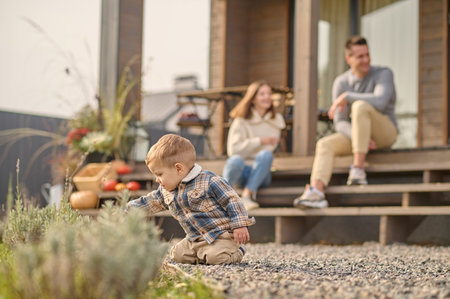 Family of three people in the countrysideの写真素材