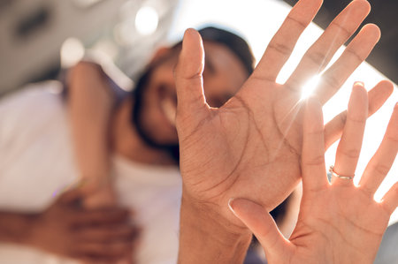 Close up picture of female and male handsの写真素材