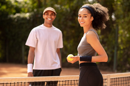 Young tennis players at the tennis courts having a workout