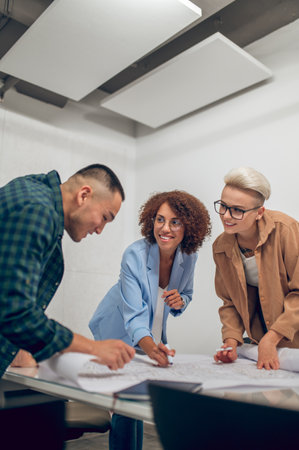 Team of engineers working on a building projectの写真素材