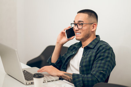 Company manager talking on the mobile phone