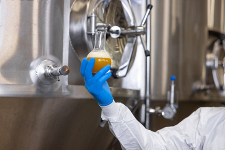 Professional brewer working at a beer plantの写真素材