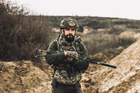 A soldier with a rifle on a shooting range