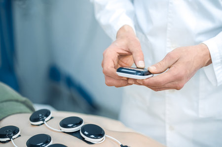 Close up picture of man having back treatment