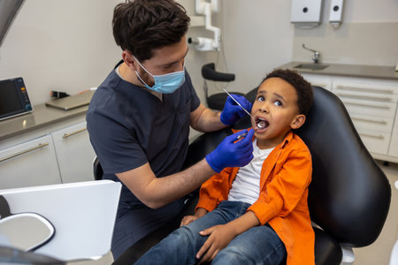 Male doctor in mask checking up his patient