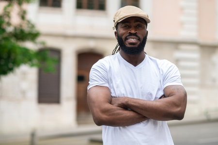 Well-built good looking african american man in a white tshirtの写真素材