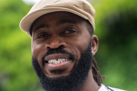 Portrait picture of a smiling dark-skinned handsome manの写真素材