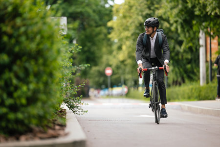 Manager commuting to the office by bike