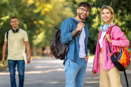 Group of young people having a walk in the park