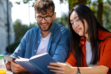 Friends studying together and feeling happyの写真素材