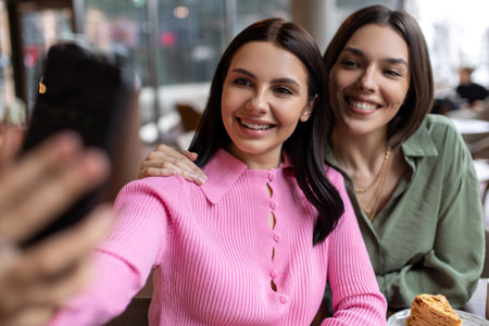 Happy girls spending time together and looking excited