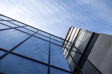Picture of a blue skies under the high building