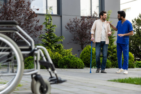 Doctor and patient having a talk in a hospital yard
