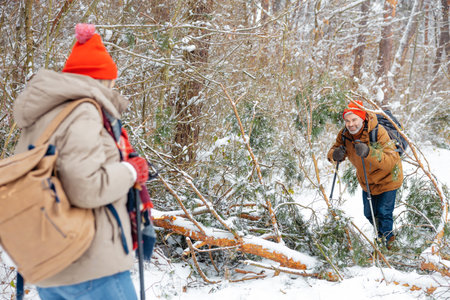 A mature couple spending good time together in a winter forestの写真素材