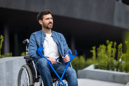 Young disabled man on a wheelchair