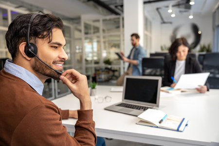 Ambitious employees working in professional coworking space
