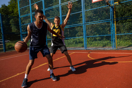 Basketball players have training outdoor playing together