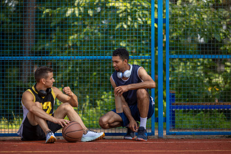 Basketball players have training outdoor playing togetherの写真素材